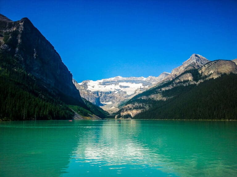 The view over Lake Louise with the Plain of Six Glaciers Trail end way in the distance.
