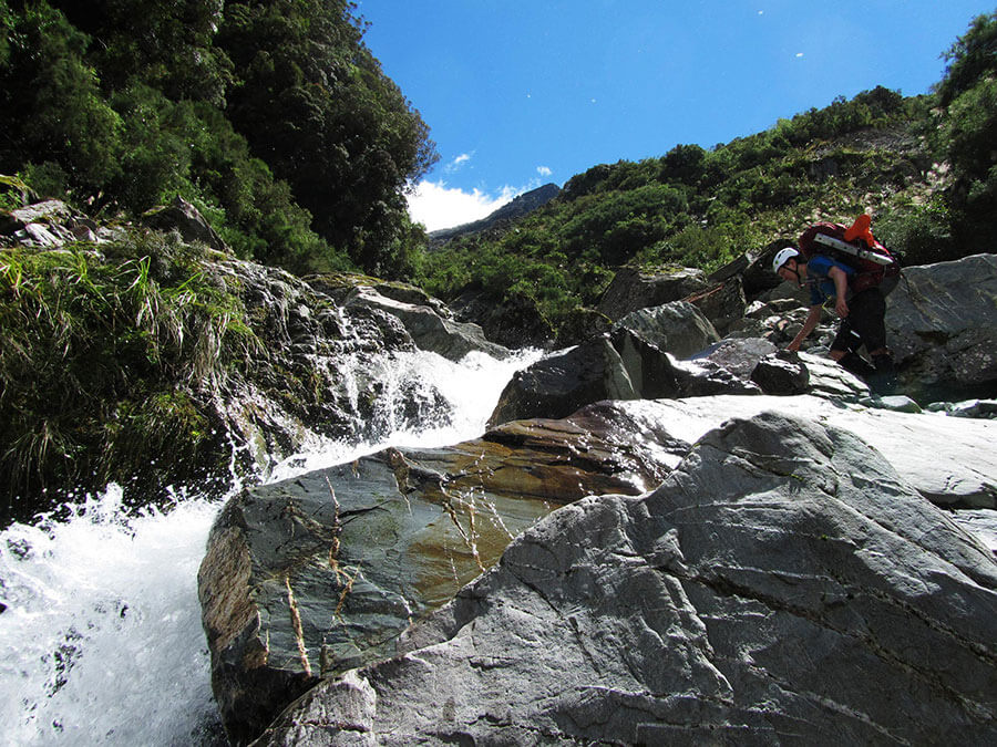 Battling against the water up Redfield Stream before the vertical bush moment.