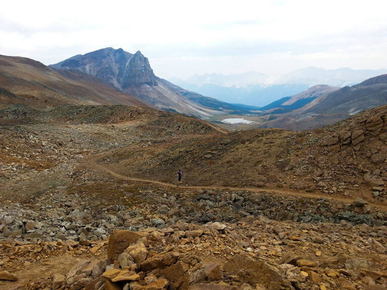 The beginning of the switchback descent infront of the rocky Mt Tekarra peak and Tekarra Lake below.