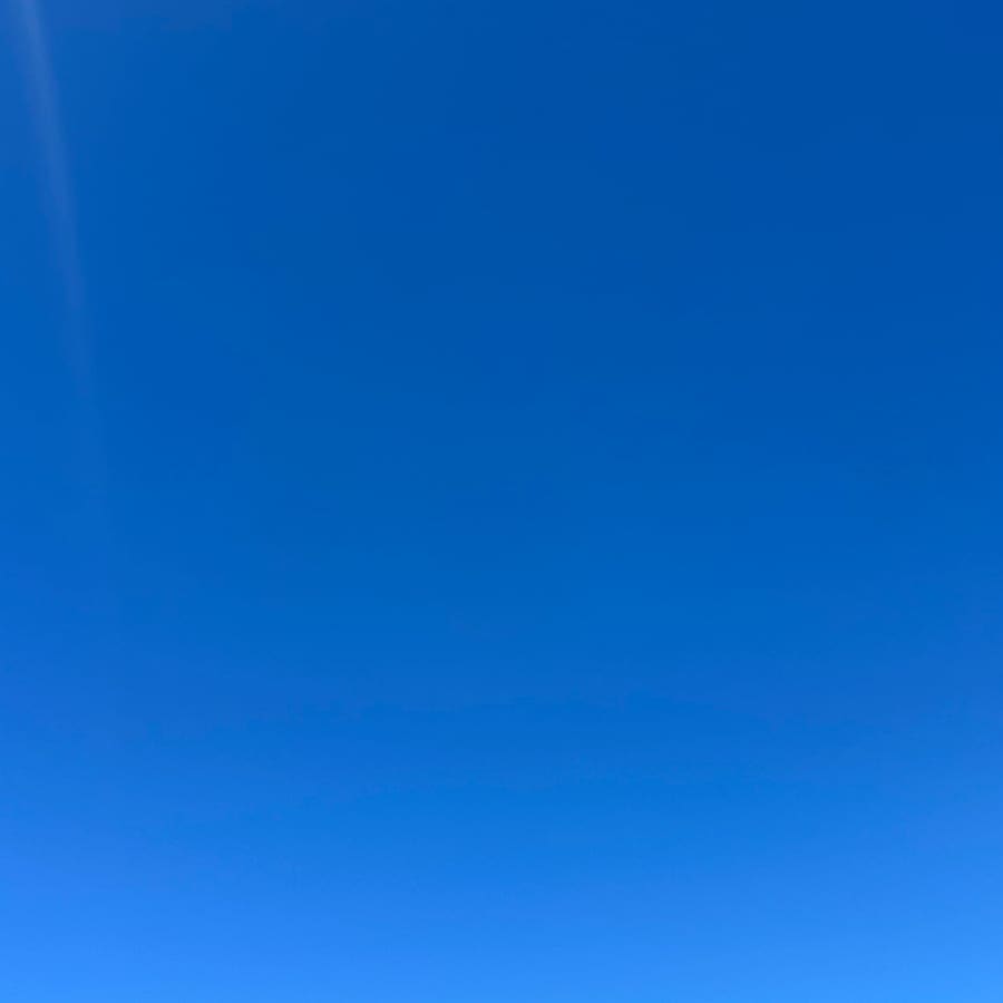What is the colour of the sky?